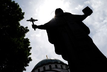 Monument of St. Sava is seen in front of the temple during Good Friday in Belgrade