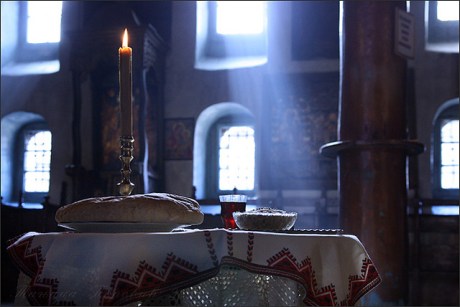 remembering the departed in Orthodox Chrisitian Church - offering bread, boiled wheat and red wine that are blessed by the priest